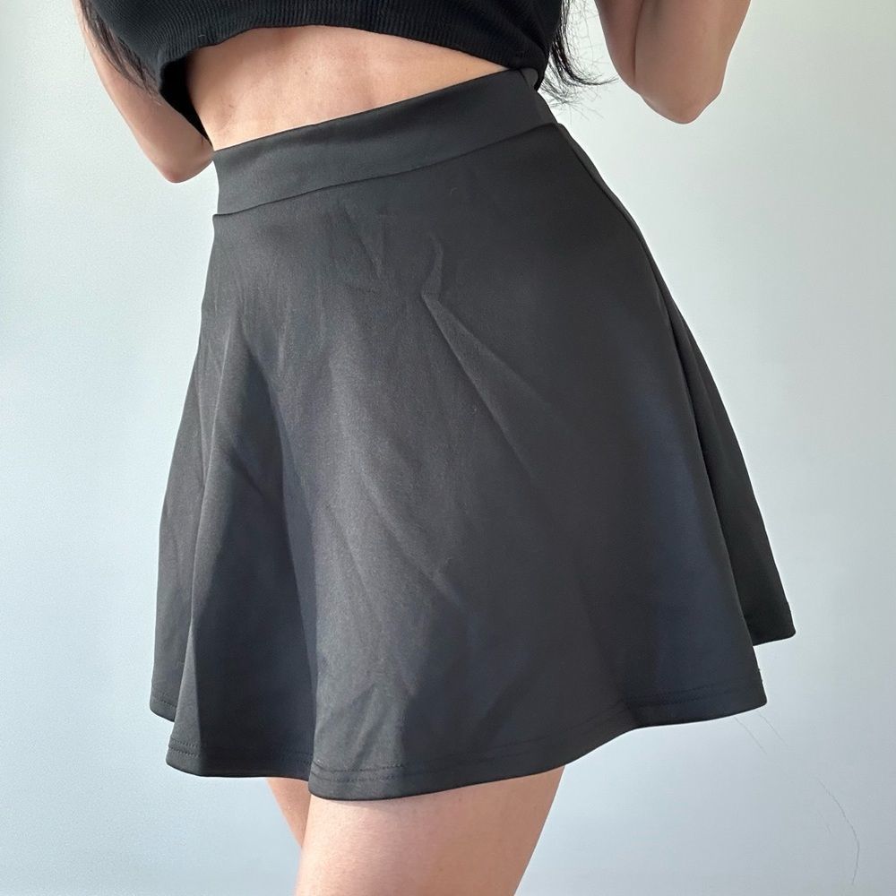 Black short stretchy flared skirt